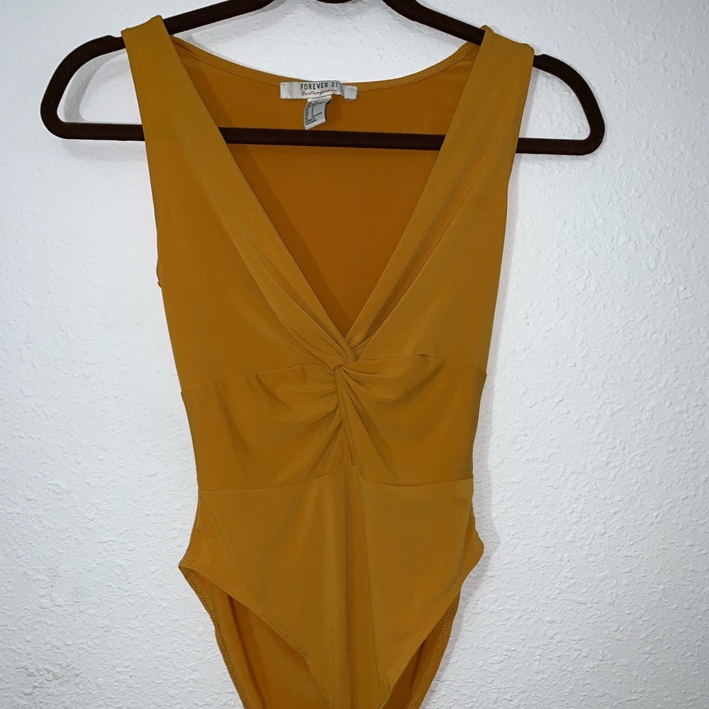 Yellow bodysuit